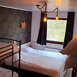 Chez Dikke Vriend, Et Taverne * Chiny